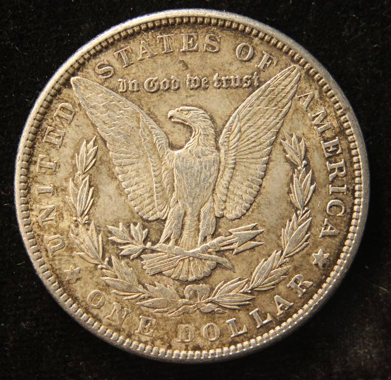 1900 MORGAN SILVER DOLLAR AU50 NICELY TONED