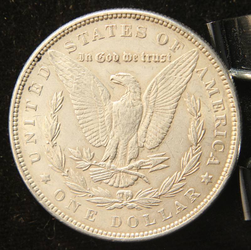 1886 MORGAN SILVER DOLLAR AU