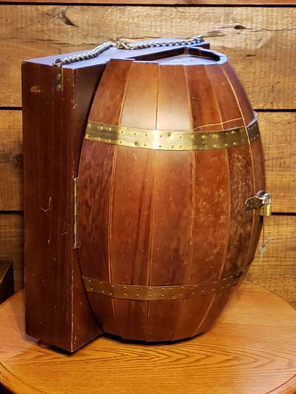 lot 14 image: Mid Century Karoff Barrel Bar Cabinet and Barware Set