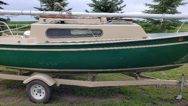 lot 1 image: Southcoast 22 Sailboat with 7.5 Mercury Motor and Trailer