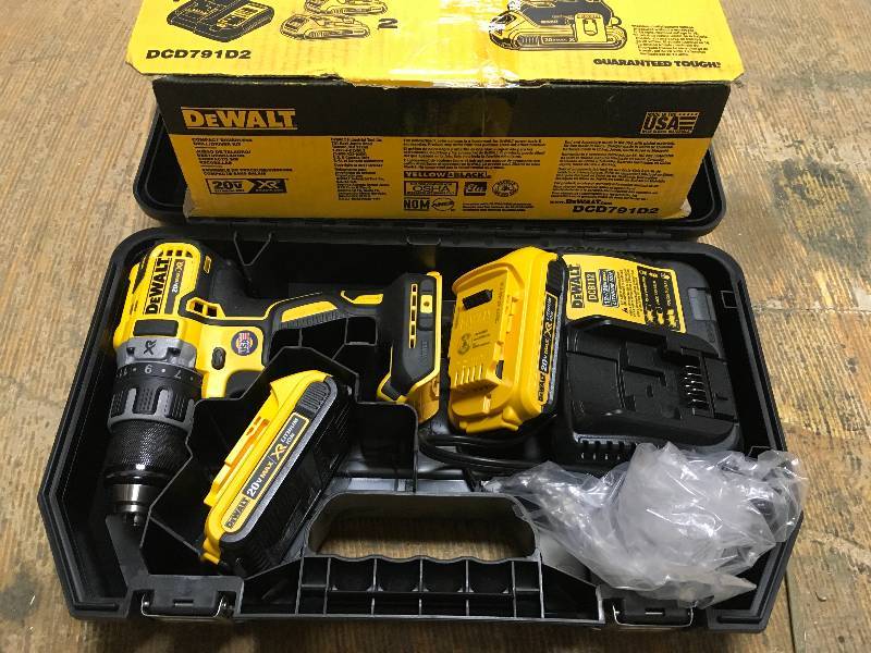 Dewalt 20-Volt MAX XR Lithium-Ion Cordless 12 in. Brushless Compact DrillDriver Kit with (2) Batteries 2Ah, Charger and Case in working conditions