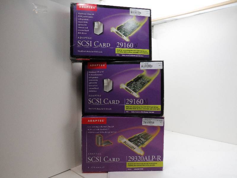 lot 8 image: LOT OF 3 ADAPTEC SCSI CARD 29160 STILL IN THE BOX