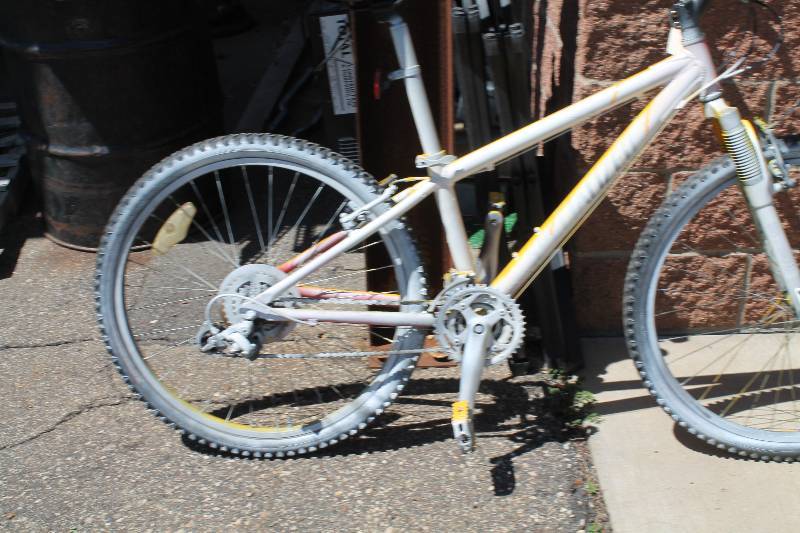 lot 4 image: Specialized Brand Bicycle 26 Tires Has White Paint All Over