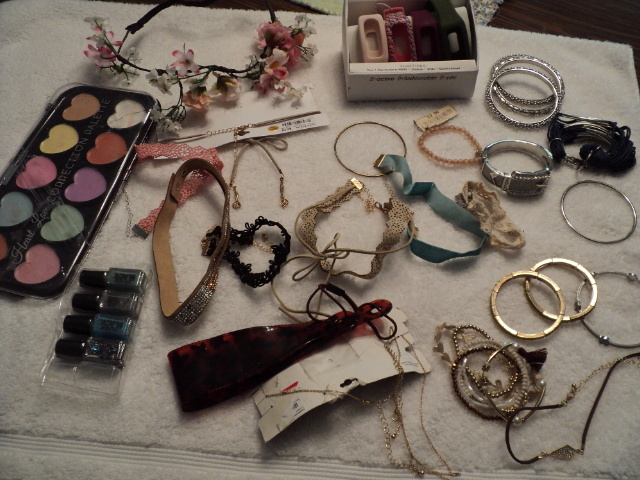 lot 32 image: bracelets, necklaces, and miscellan...