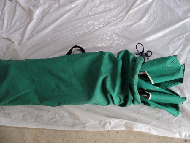 lot 47 image: green sleeping cot...