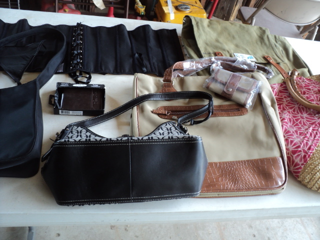 lot 59 image: bags, purses, corset and billfold...