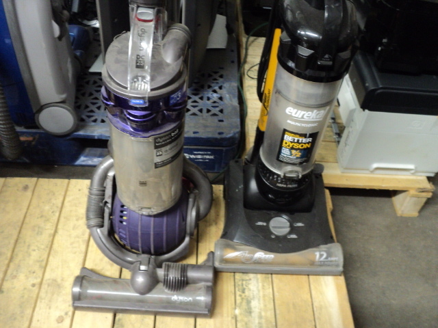 lot 204 image: 2 vacuum cleaners - Dyson and Eurek...