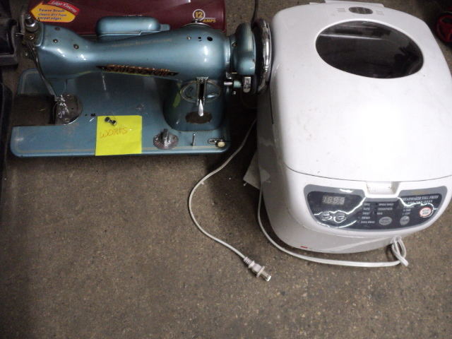 lot 207 image: sewing machine and bread maker - po...