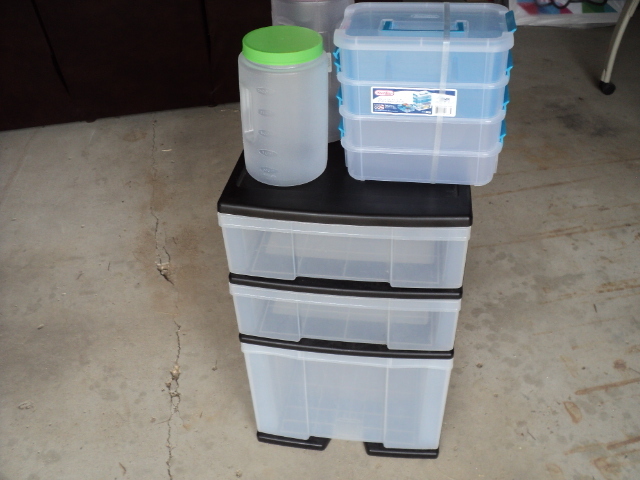 lot 235 image: 3 drawer storage, 2 jars, and stack...