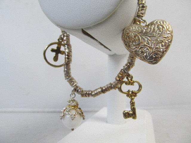 lot 72 image: Signed Sterling Silver DYADEMA Italian Charm Bracelet