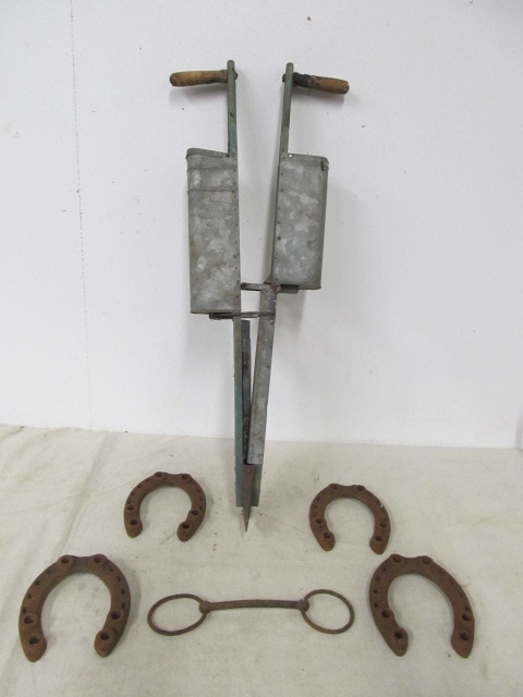 lot 159 image: Antique Green Painted Seeder & Horseshoes