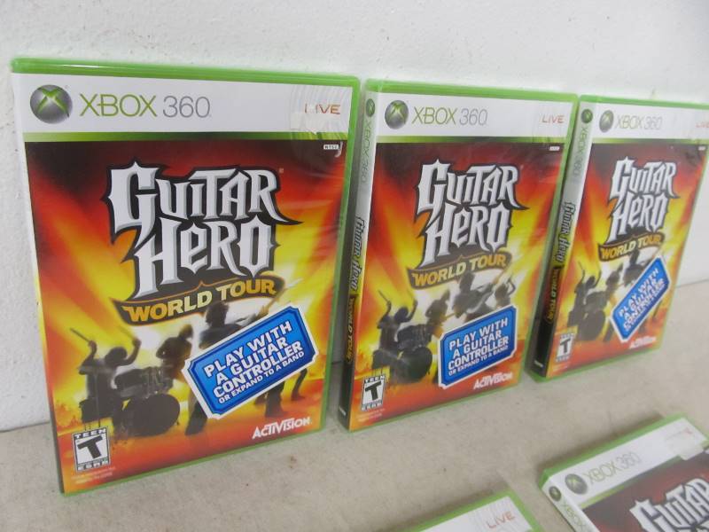lot 123 image: Lot of 5 Factory Sealed Guitar Hero World Tour XBOX 360 Video Games