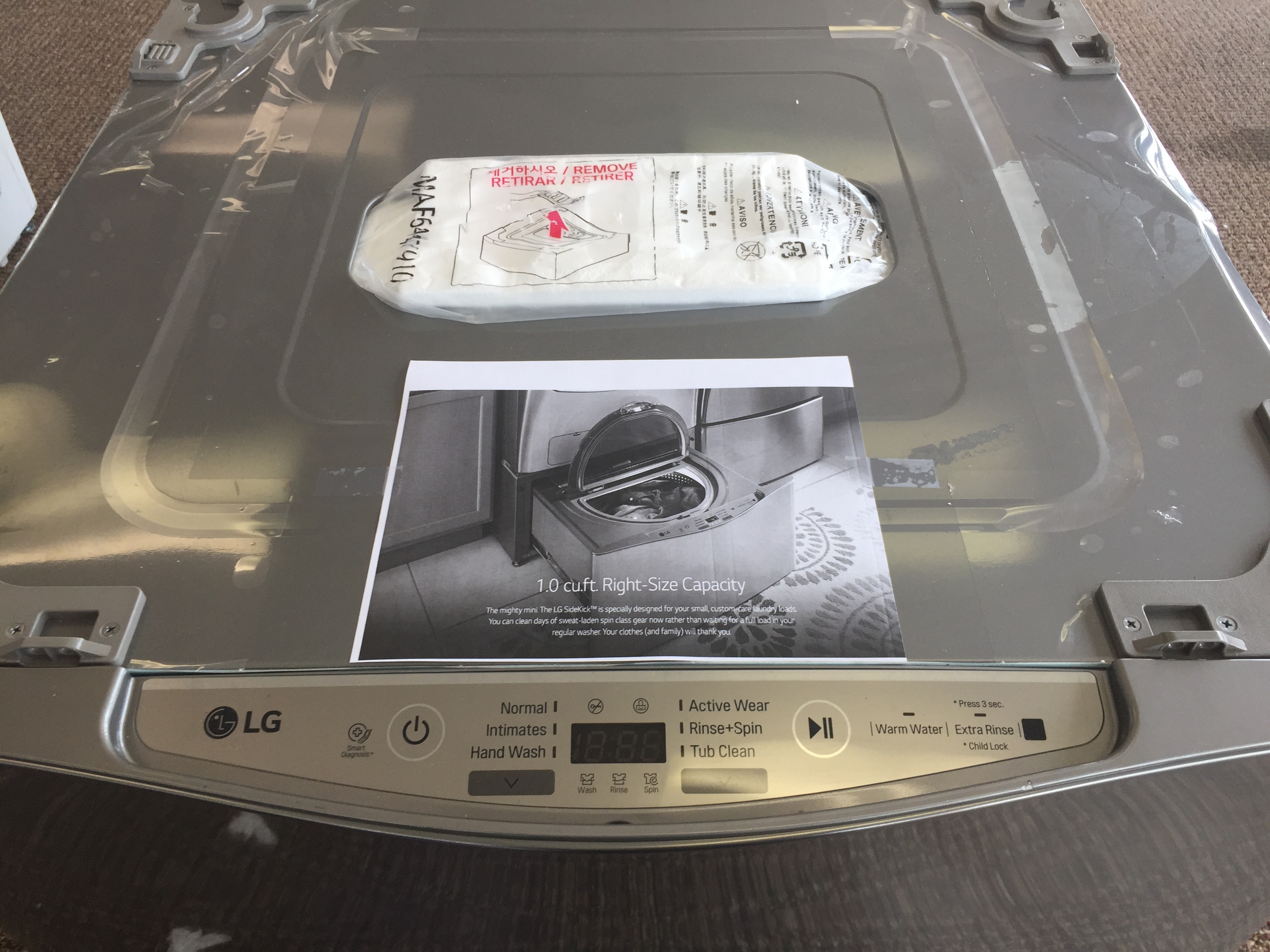 lot 6 image: NEW 29 in. 1.0 cu. ft. LG SideKick Pedestal Washer in Graphite Steel Model # (WD200CV)