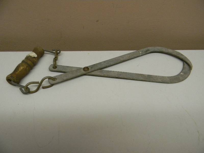 lot 25 image: VINTAGE ICE TONGS RARE METAL WITH WOOD HANDLE - SEE PICTURES