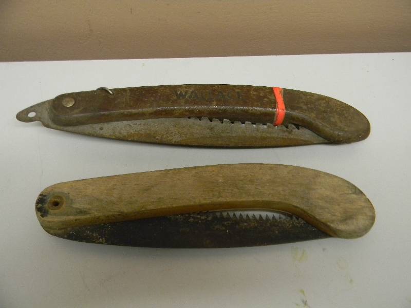 lot 28 image: VINTAGE COLLECTIBLE WOOD HANDLE FOLDING SAWS - SEE PICTURES