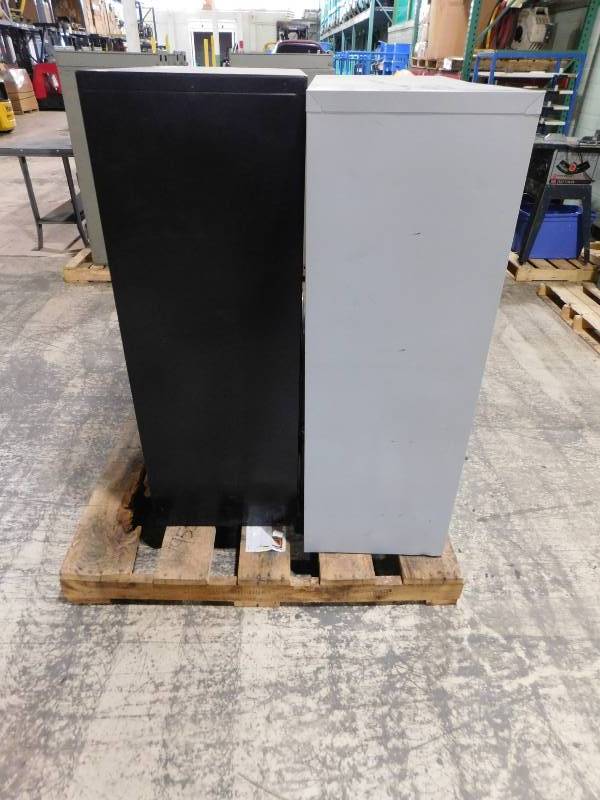 Two Metal Four Drawer Filing Cabinets
