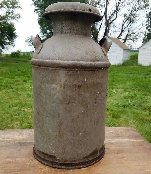 lot 38 image: Vintage Milk Can 2 feet high Excellent Shape