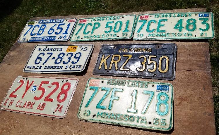 lot 141 image: Licences Plates from Minnesota & California & Alberta