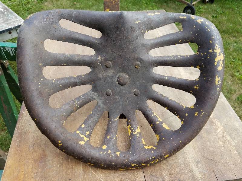 lot 154 image: Old Tractor seat and mounting bracket