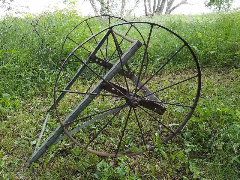 lot 156 image: Antique wheels and handle