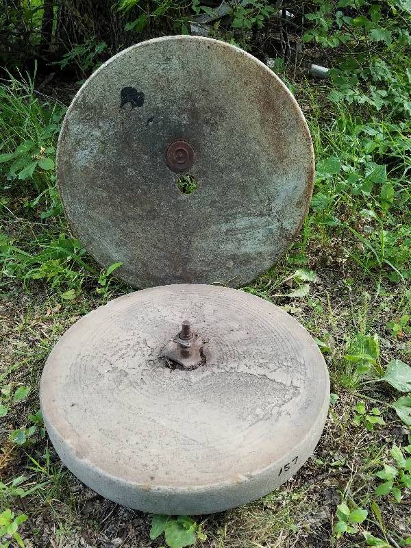lot 157 image: 21 inch diameter grinding stone with covers