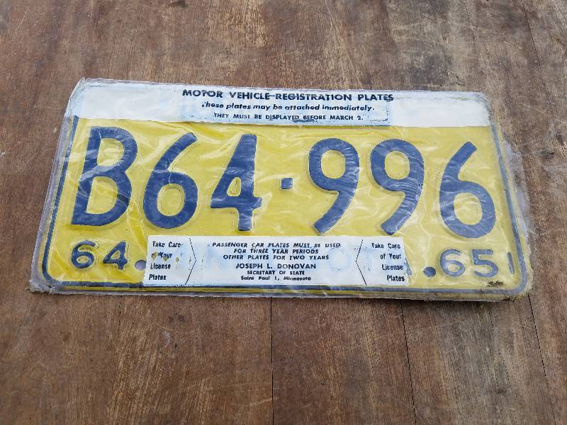 lot 161 image: 1965 Minnesota License plate still sealed