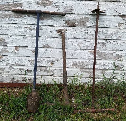 lot 181 image: Large post hole digger with a small hole digger & Pic Axe