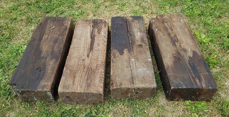 lot 184 image: 4 large wood blocks for farm implements