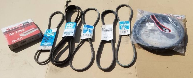 lot 218 image: Auto air filter,5 various belts and heater hose 58 I.D