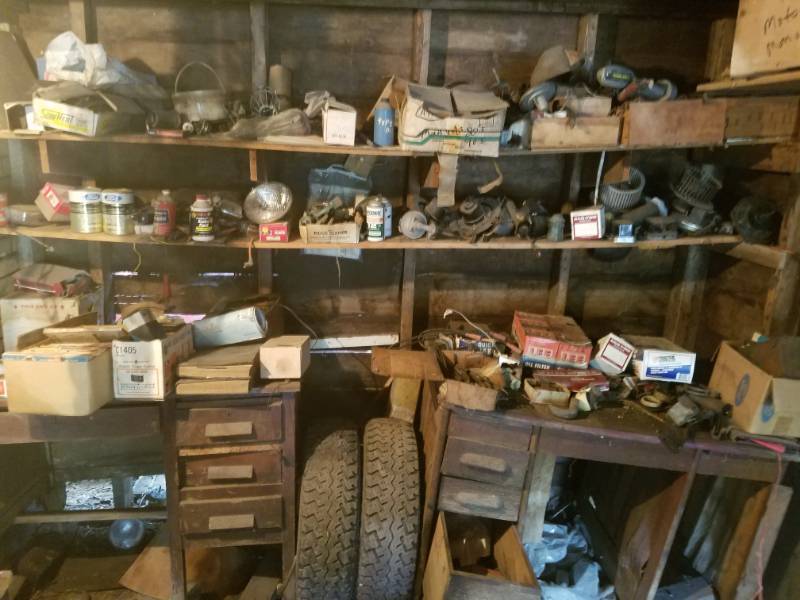 lot 228 image: Contents of wall and desks mostly automotive parts & Grill screen for a 1962 Ford Car