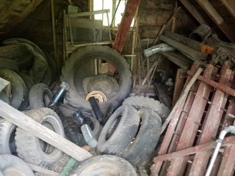 lot 230 image: Contents of SE Shed Truck & Tractor Tires, small engines & Drag Section