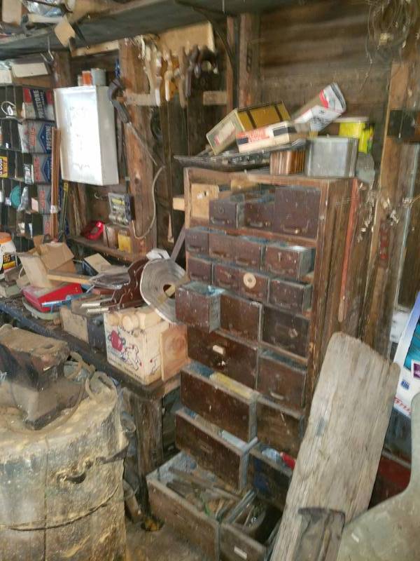 lot 236 image: Contents of West Wall Bolts, Springs, Pins, Saws, Paint