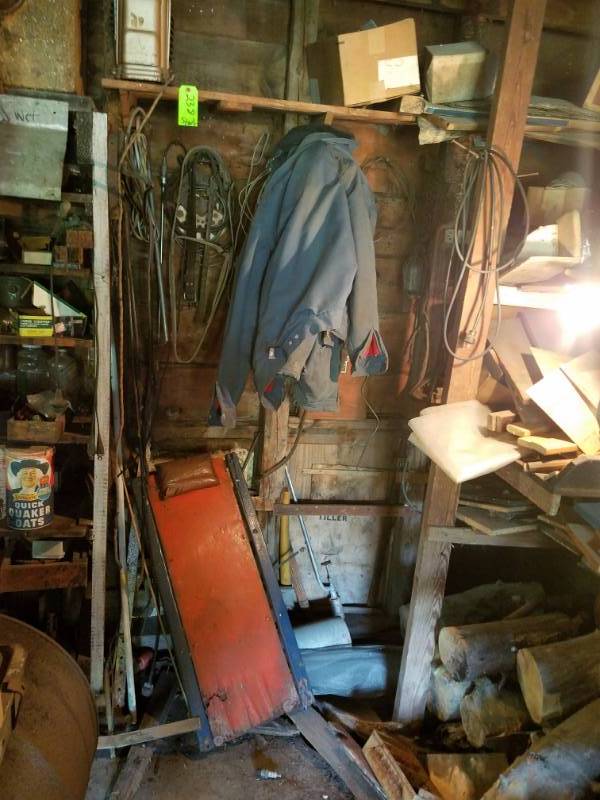 lot 238 image: Contents of East Wall many used farm & auto items & Fire Wood