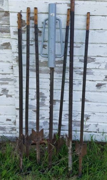 lot 242 image: 7 Fence posts and a Post Pounder