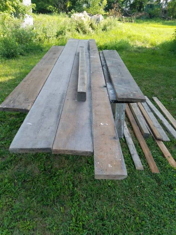 lot 243 image: Large lot of Lumber 2 x 18 stored indoors