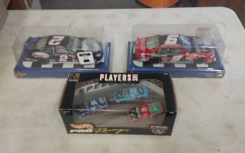 lot 62 image: Nascar Race Cars