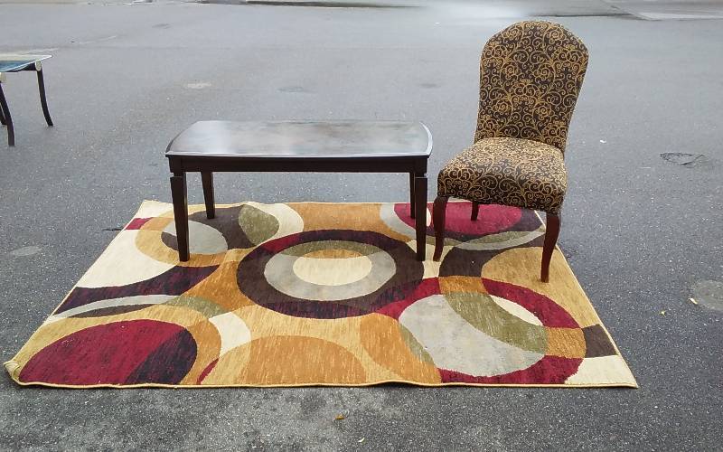 lot 17 image: Coffee Table 48x24x21, Rug 86x63, Chair 40 Inches