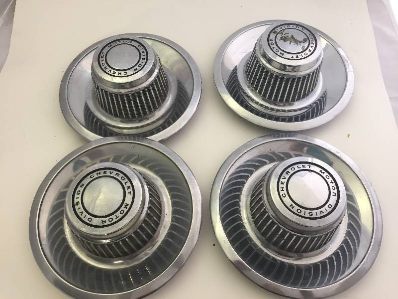 lot 110 image: Vintage Chevrolet Hub Caps