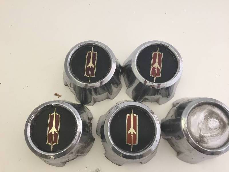 lot 111 image: Vintage Hub Cap Middles