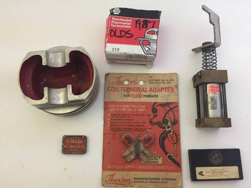 lot 134 image: Vintage Tiny Tim, Piston Cover, Coil Terminal, Thermostat