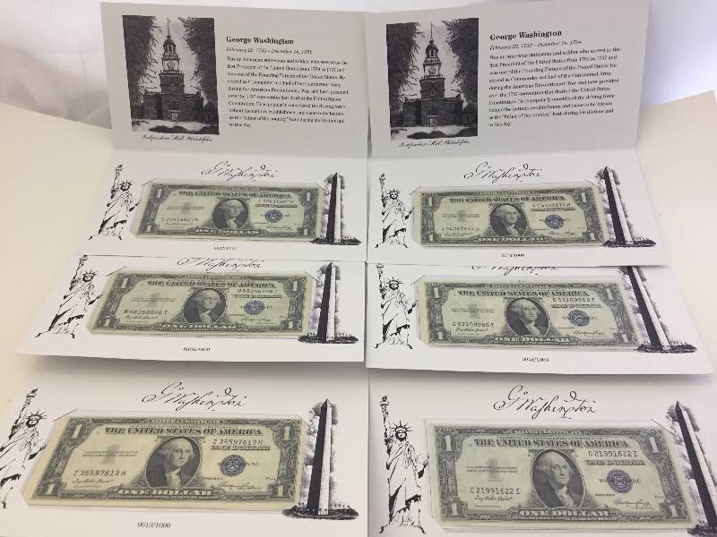 lot 10 image: $1 Silver Certificate Dollar Bills Currency in Folders - qty 6