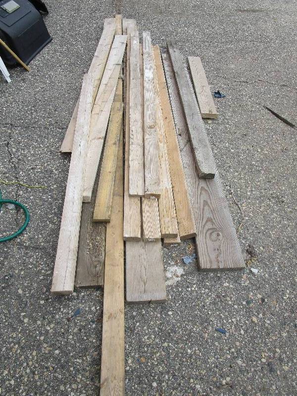lot 53 image: pile of boards. Lots of 82x4 and 12 ft 1 and lots more
