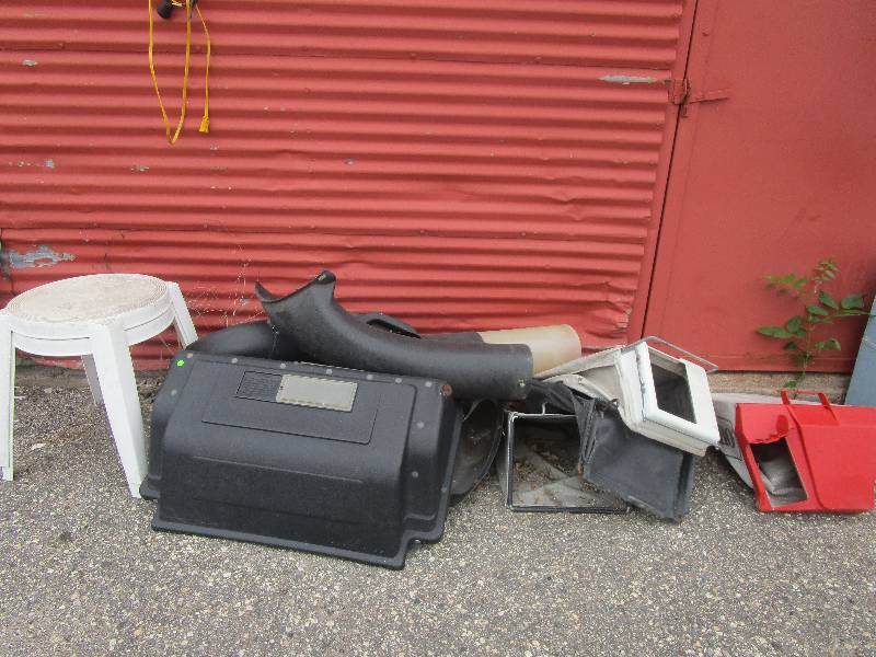 lot 55 image: All the lawnmower bags and bagger system plus patio tables and garden hoses