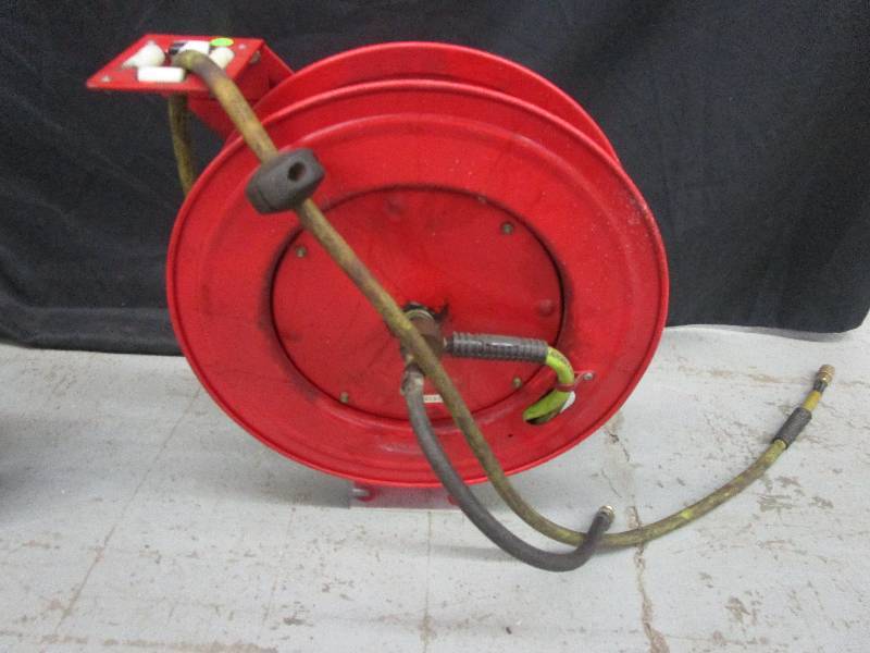 lot 59 image: Airhose and reel (Red) bracket to hang on wall