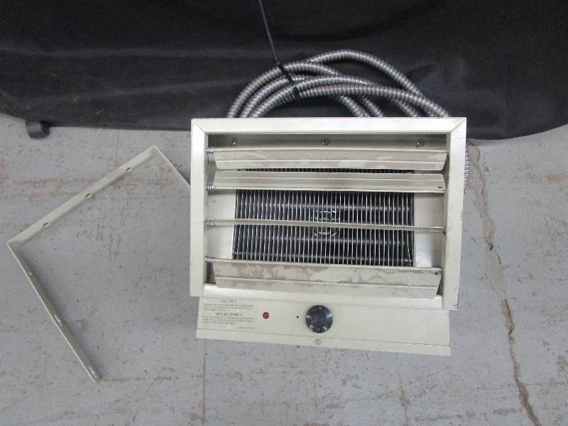 lot 62 image: Nice garage heater looks unused