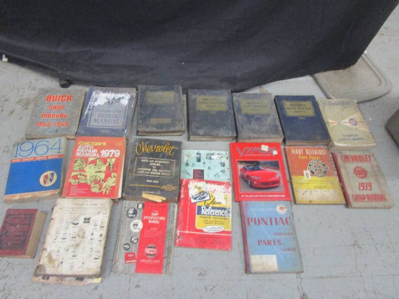 lot 63 image: Lots of old cartruck manuals and tub with cover