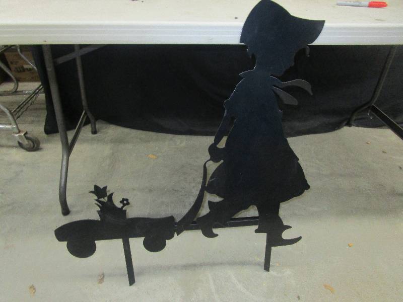 lot 75 image: a little girl pulling her wagon decoration for your flower bed