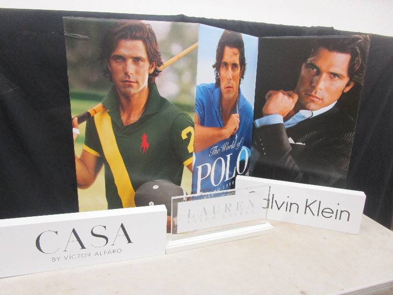 lot 80 image: Calvin Cline, Ralph Lauren and other store signs some I just unwrapped out of the box