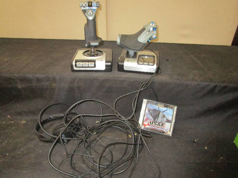 lot 140 image: Flight simulator game and controllers not tested