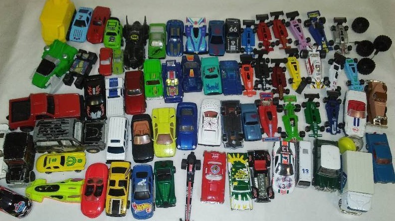 60  Hot Wheels sized cars mixture of Brands